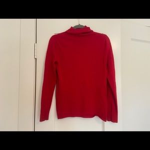 Red turtleneck sweater